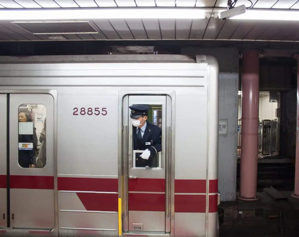 A train conductor in Shinjuku, Tokyo.