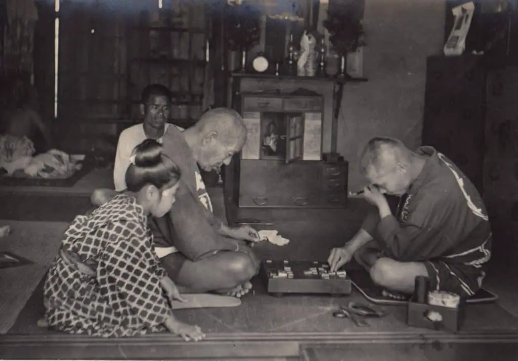 old photo of men playing shoji